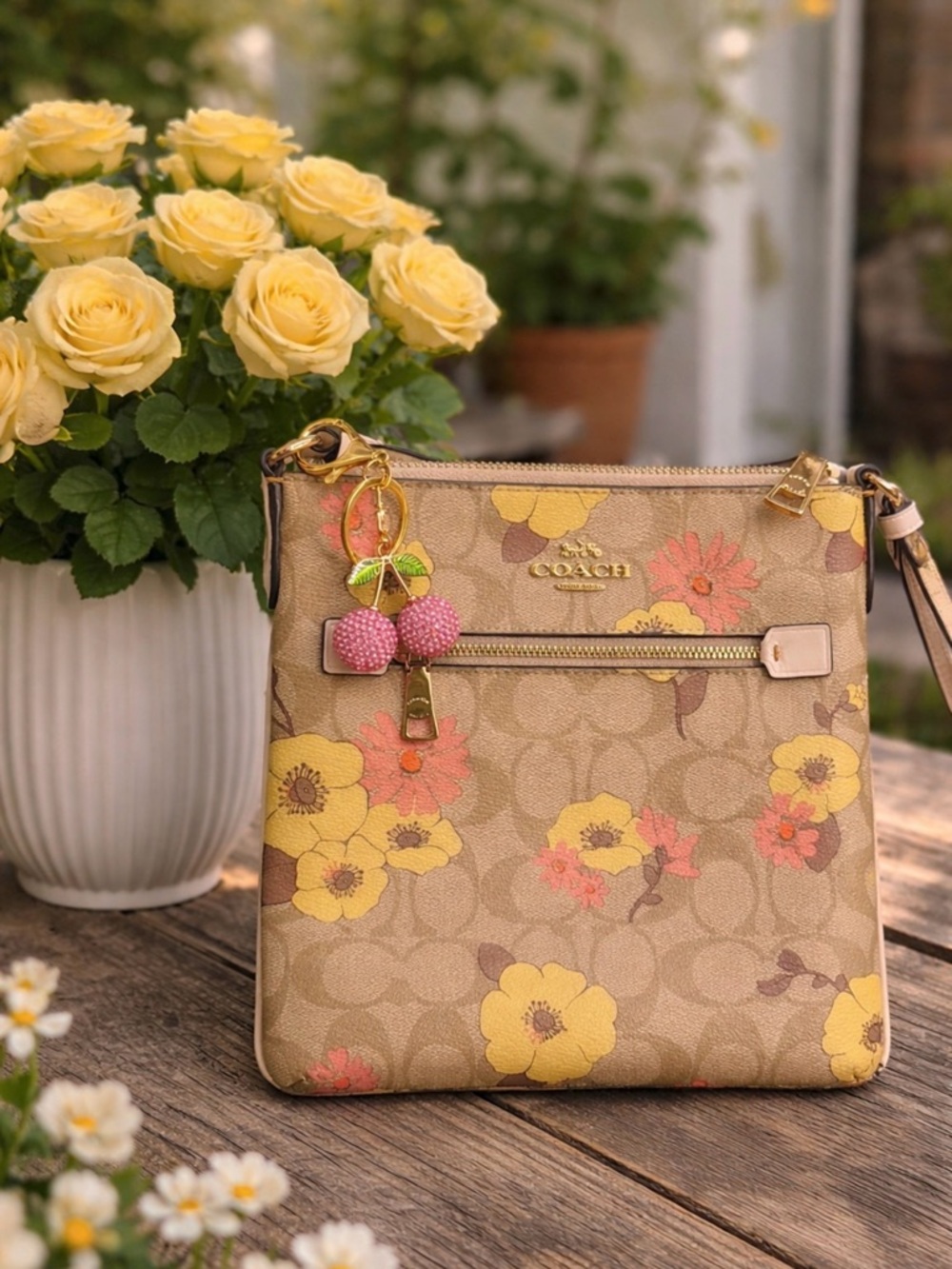 Coach Tan Signature Floral Crossbody with Yellow and Pink Accents